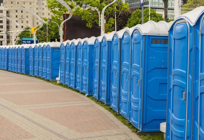 a row of portable restrooms at a trade show, catering to visitors with a professional and comfortable experience in Addison